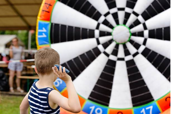 Close-up of dart board with numbers for educational games.