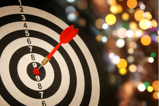 Strategic region selection on a dart board for scoring