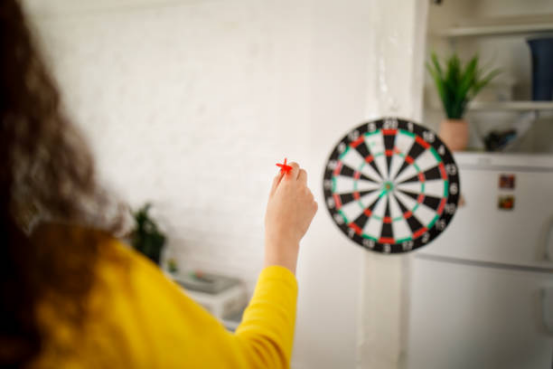 Sound-absorbing materials for a quieter Dart board training space.