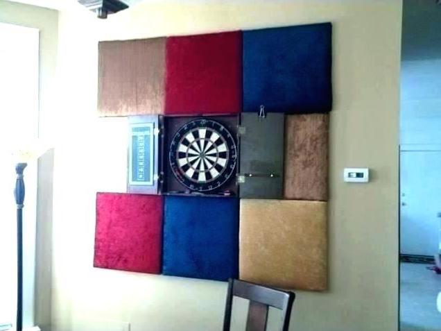 Elegant dart board set into a multi-colored upholstered wall art display.