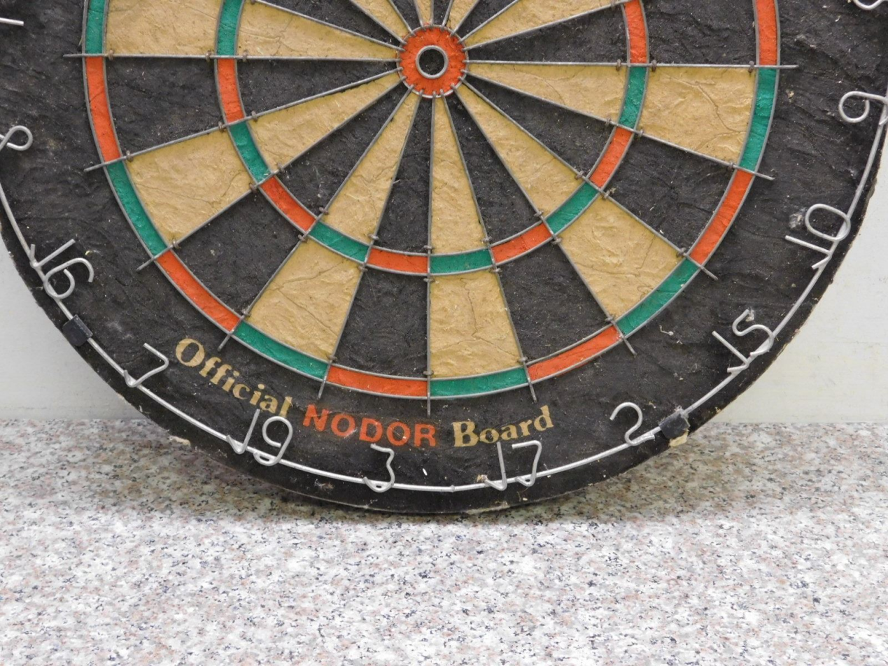 Official Nodor dart board close-up, showing the numbers and board texture.